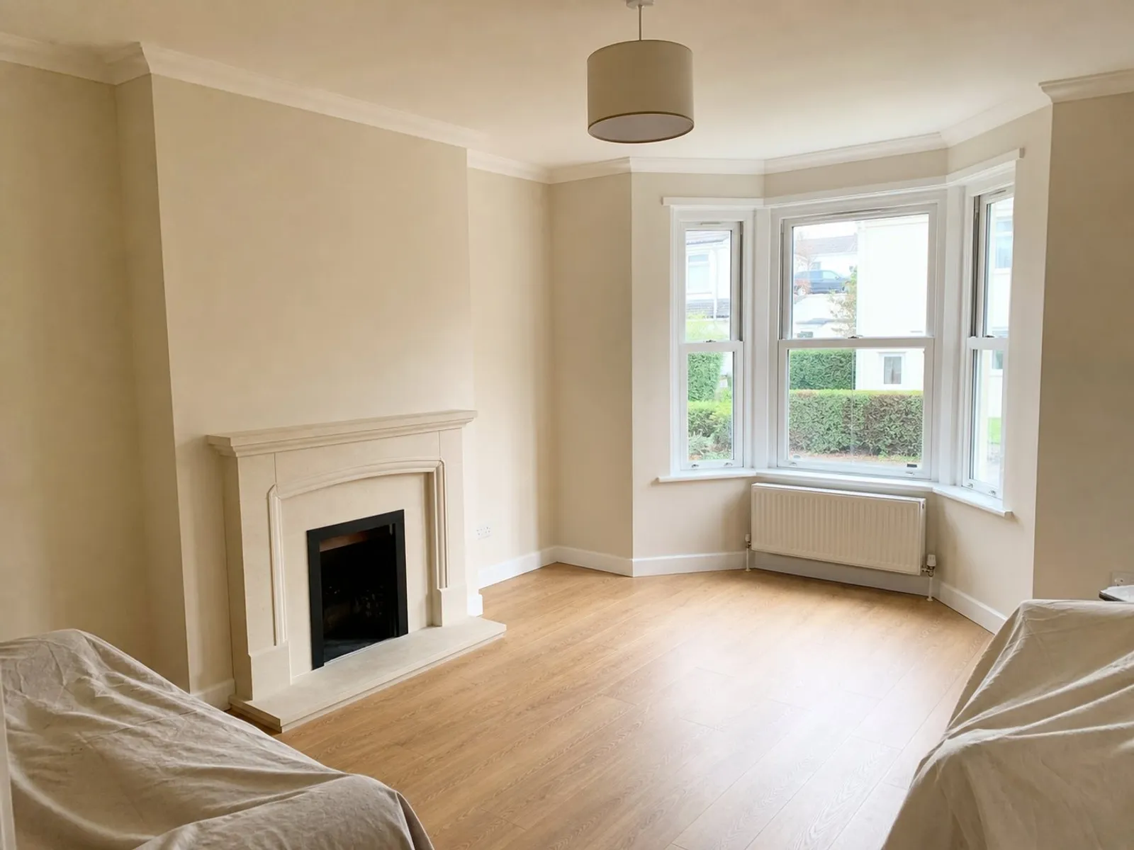 Freshly painted living room with clean cut-in edges and even coverage
